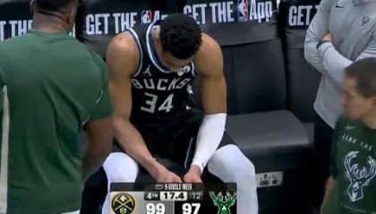 best365登录网页版-字母哥在替补席神情落寞，脚部已被缠上厚厚绑带